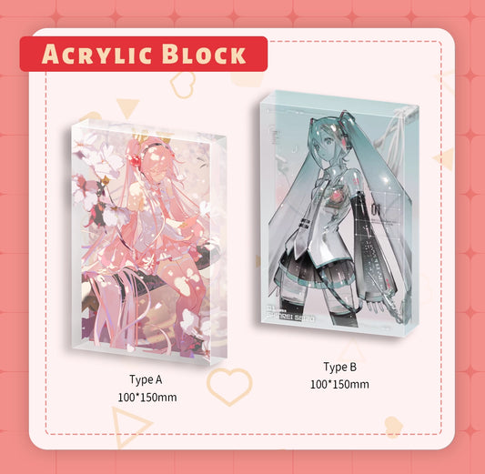 Two acrylic blocks with anime character named 'hatsune miku' designs on a pink background